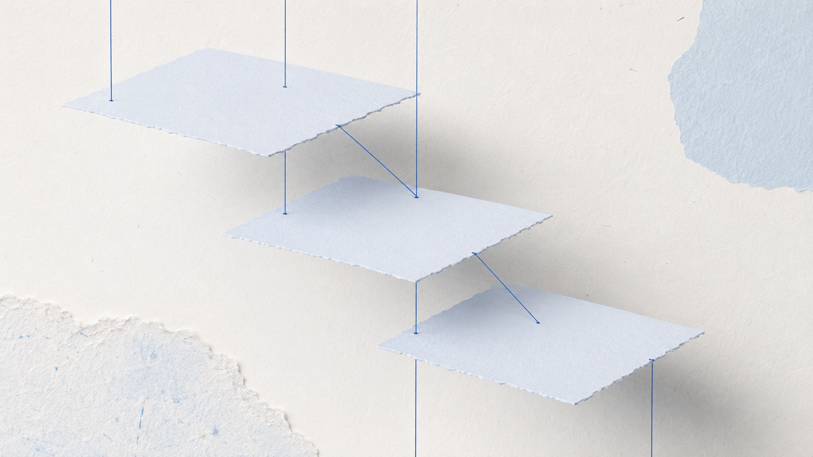 Three abstract layers in pale blue paper